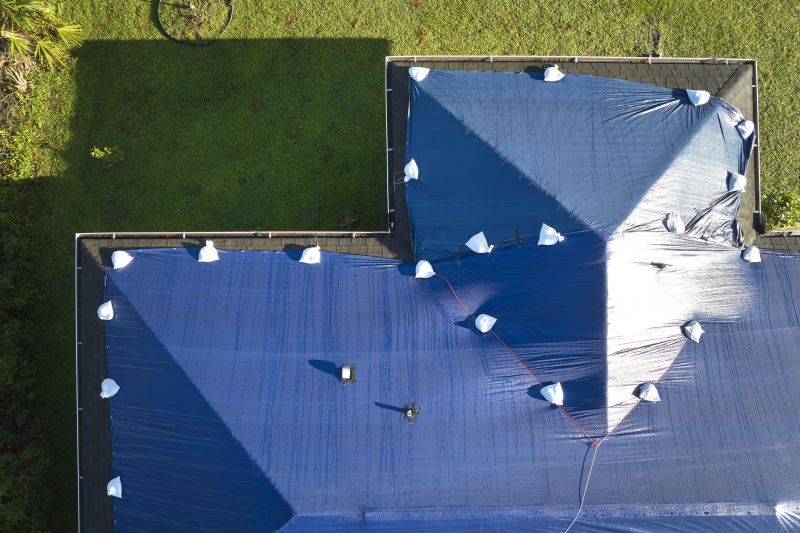 Storm Damage Roof Tarping in Hawley, PA