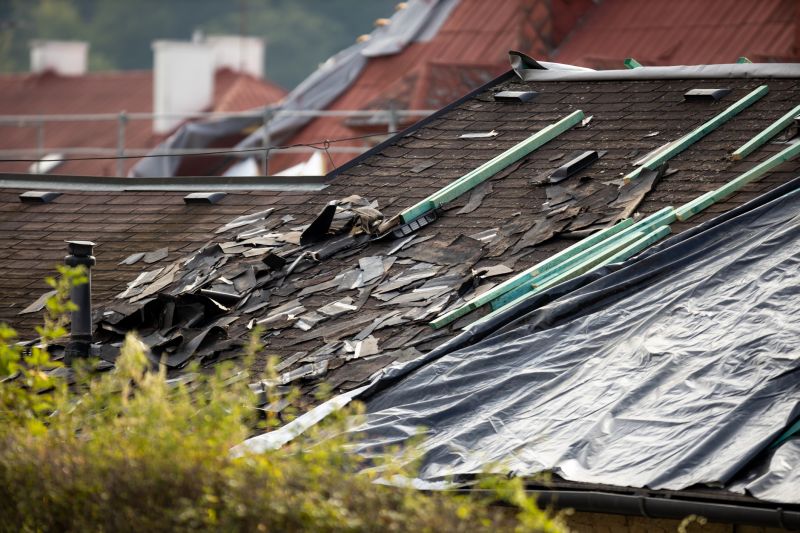Storm Damage Roof Tarping in Hawley, PA
